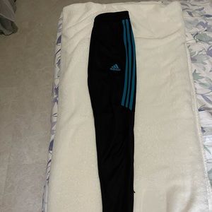Adidas joggers with zip up. Black + blue/turquoise stripes. Size; extra small.
